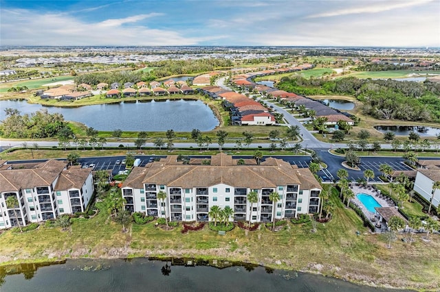 birds eye view of property featuring a water view