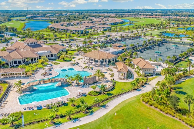 aerial view featuring a residential view and a water view