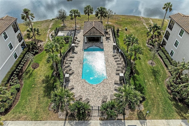 view of pool with a water view