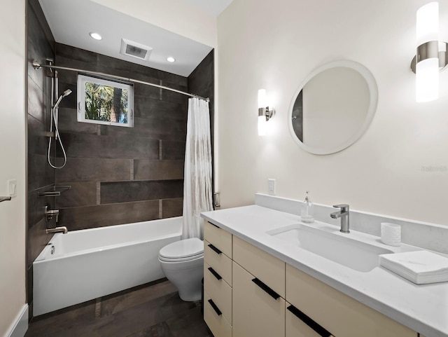 bathroom featuring recessed lighting, visible vents, toilet, shower / bath combo, and vanity