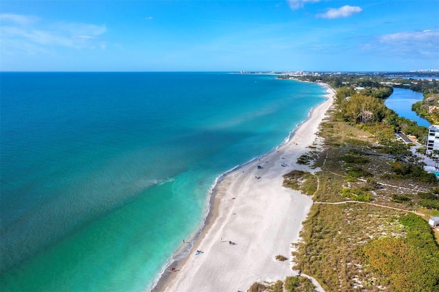 drone / aerial view with a view of the beach and a water view