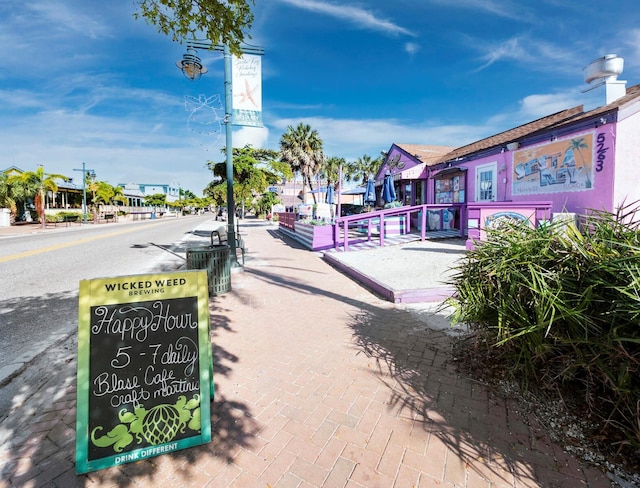 view of street featuring curbs and sidewalks