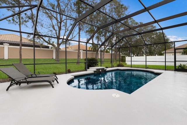 view of swimming pool with a patio area and glass enclosure