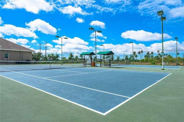 view of sport court with fence