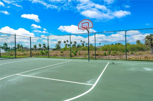 view of sport court featuring community basketball court and fence