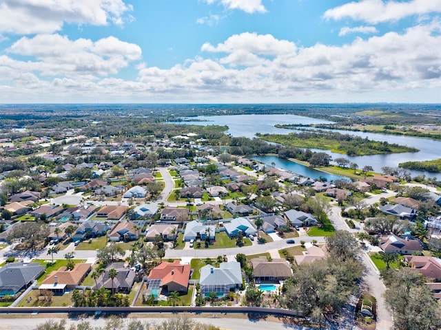 aerial view featuring a water view and a residential view