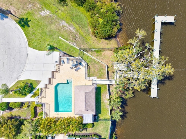 birds eye view of property featuring a water view