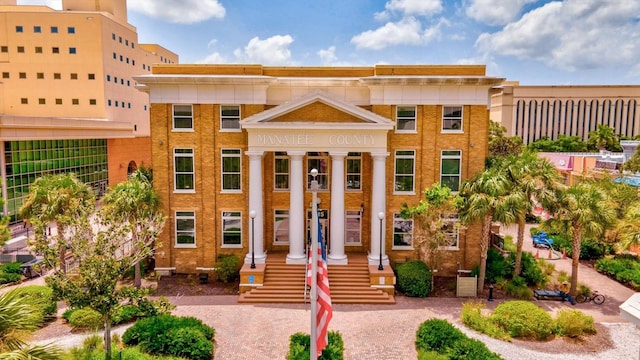 view of front of property featuring brick siding