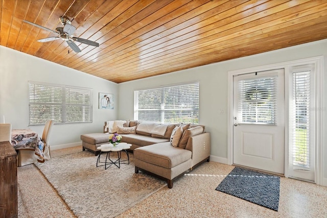 living room featuring wood ceiling, vaulted ceiling, ceiling fan, baseboards, and speckled floor