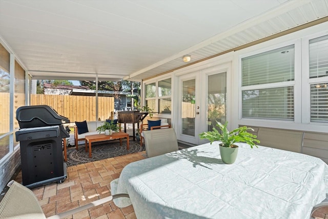 sunroom / solarium featuring a wealth of natural light