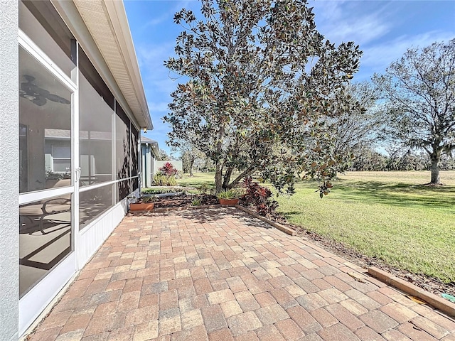 view of patio / terrace with a sunroom