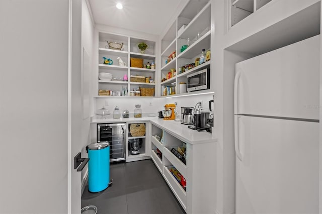 pantry featuring beverage cooler