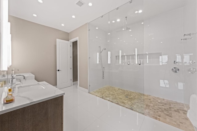 bathroom featuring tile patterned flooring, visible vents, walk in shower, recessed lighting, and vanity