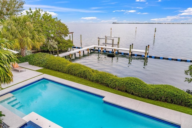 pool featuring a dock and a water view