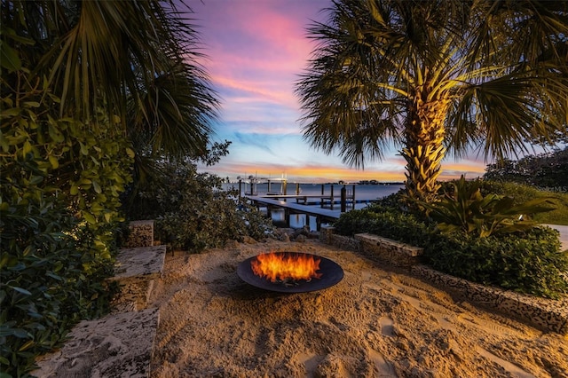 dock area featuring an outdoor fire pit