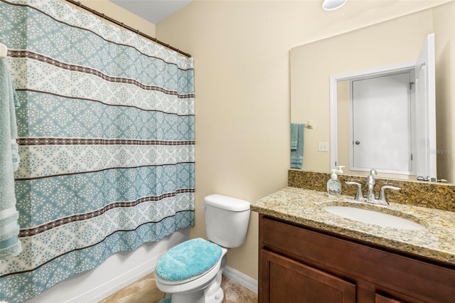 bathroom featuring shower / tub combo, baseboards, vanity, and toilet