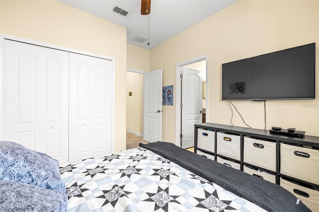 bedroom with ceiling fan, a closet, and visible vents