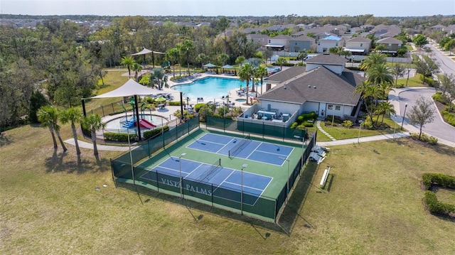 birds eye view of property with a residential view