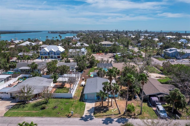 bird's eye view featuring a residential view and a water view