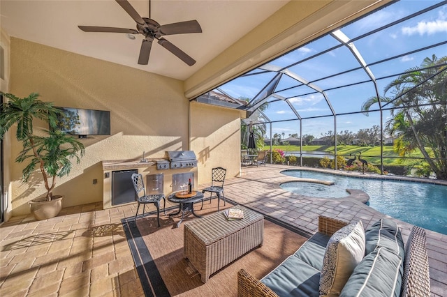 7108 Callander Cv, Lakewood Ranch, FL 34202 - view of patio with an outdoor hangout area, a ceiling fan, exterior kitchen, a lanai, and an outdoor pool