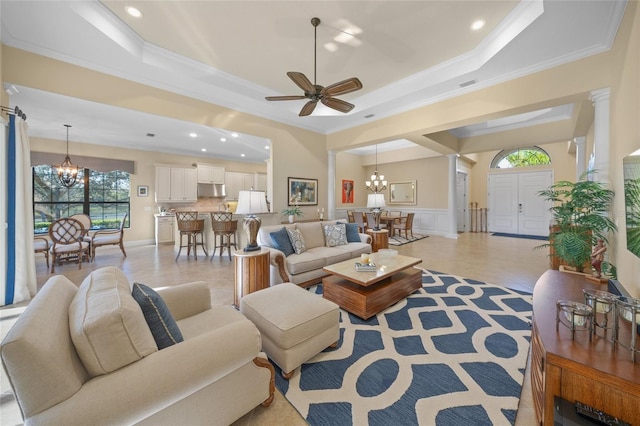 7108 Callander Cv, Lakewood Ranch, FL 34202 - living area featuring a raised ceiling and crown molding
