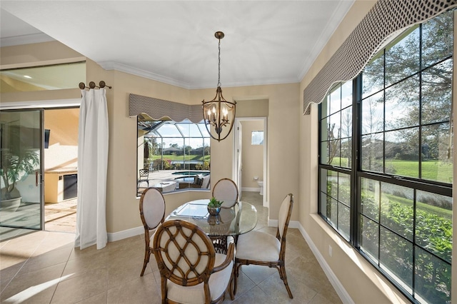 7108 Callander Cv, Lakewood Ranch, FL 34202 - dining room featuring baseboards, ornamental molding, tile patterned flooring, and an inviting chandelier