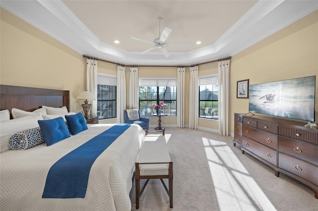 7108 Callander Cv, Lakewood Ranch, FL 34202 - bedroom with light carpet, a tray ceiling, recessed lighting, and crown molding