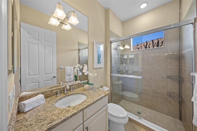 7108 Callander Cv, Lakewood Ranch, FL 34202 - full bathroom with toilet, a shower stall, and vanity
