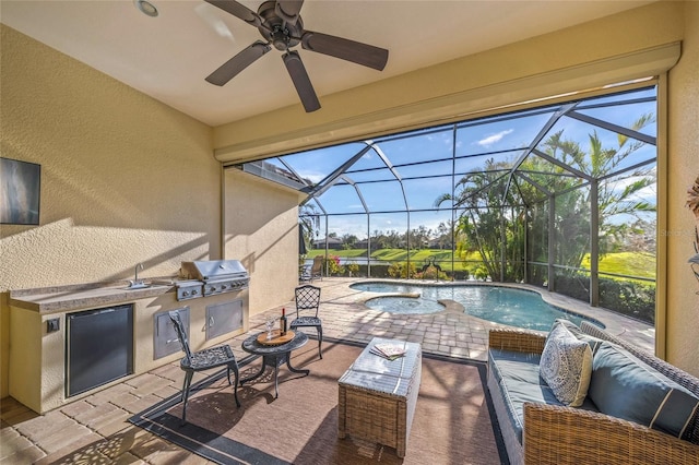7108 Callander Cv, Lakewood Ranch, FL 34202 - view of patio / terrace featuring an outdoor hangout area, ceiling fan, exterior kitchen, and a lanai