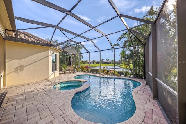7108 Callander Cv, Lakewood Ranch, FL 34202 - view of pool with glass enclosure, a pool with connected hot tub, a patio area, and a water view