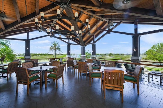 7108 Callander Cv, Lakewood Ranch, FL 34202 - view of patio featuring a gazebo, outdoor dining area, and a ceiling fan