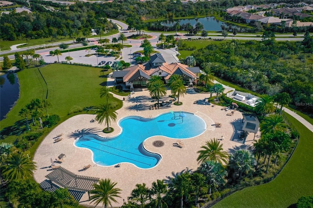 7108 Callander Cv, Lakewood Ranch, FL 34202 - view of swimming pool with a patio and a water view