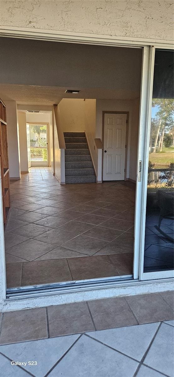 doorway to property with visible vents