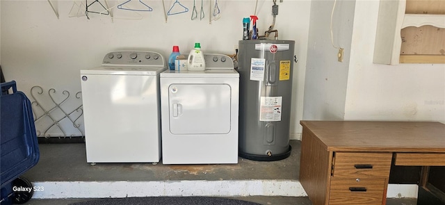 laundry area featuring laundry area, electric water heater, and washer and dryer