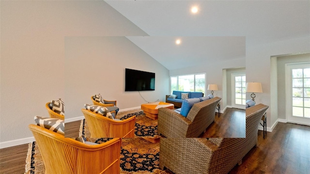 living room featuring lofted ceiling, baseboards, and dark wood-style flooring