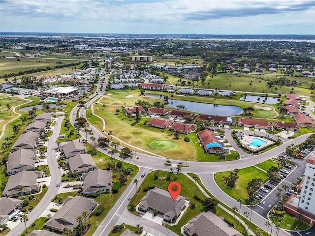 aerial view featuring a residential view and a water view