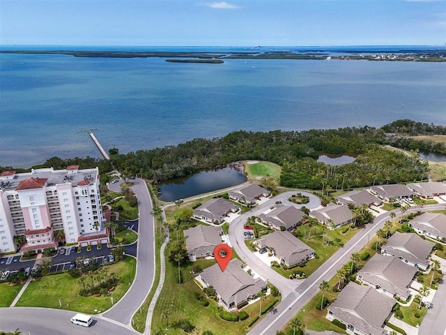 bird's eye view with a water view and a residential view