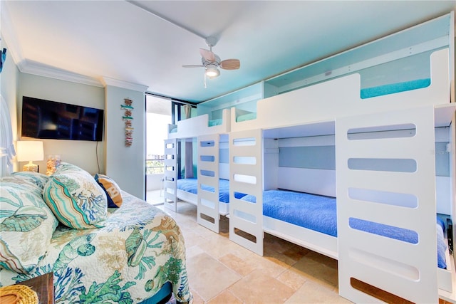 bedroom featuring expansive windows, a ceiling fan, and crown molding