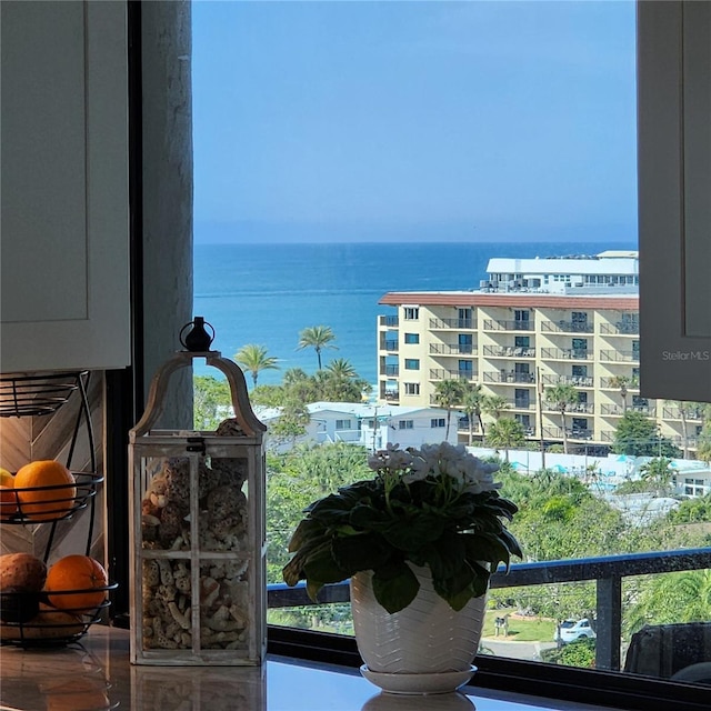 balcony featuring a water view