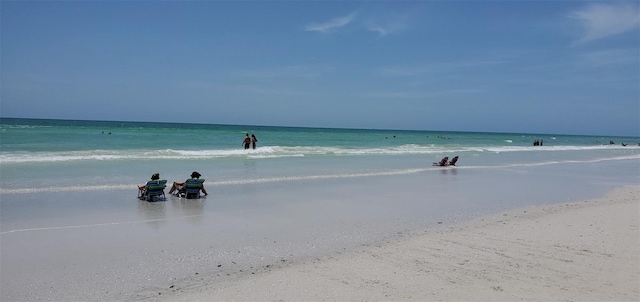 view of water feature with a beach view