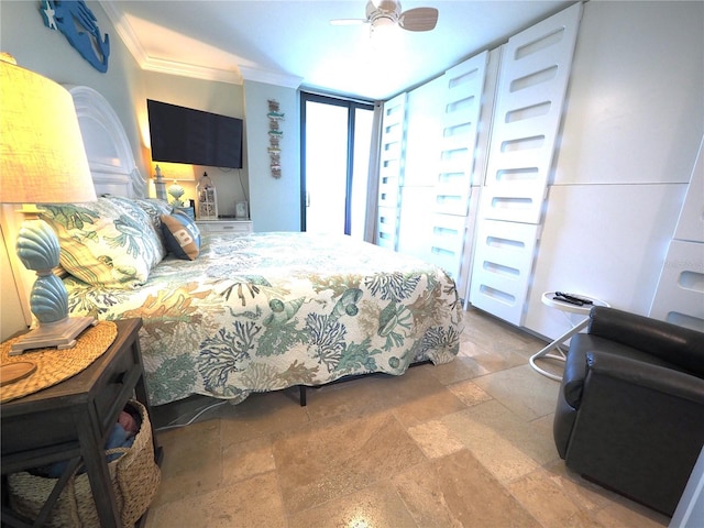 bedroom featuring crown molding, a ceiling fan, and stone tile flooring