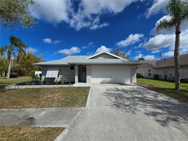 ranch-style house featuring cooling unit, driveway, an attached garage, and stucco siding