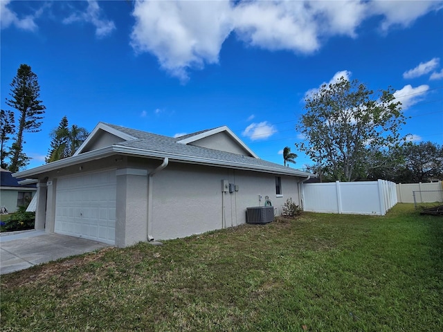 view of side of property featuring stucco siding, concrete driveway, a lawn, fence, and cooling unit