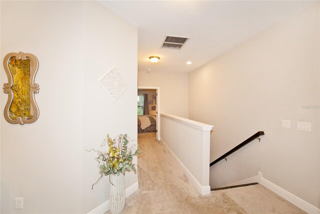5118 78th St Cir E, Bradenton, FL 34203 - corridor featuring baseboards, visible vents, carpet flooring, and an upstairs landing