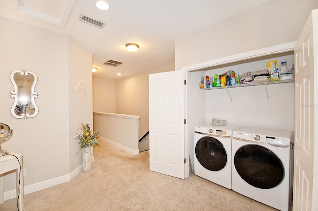 5118 78th St Cir E, Bradenton, FL 34203 - washroom featuring light colored carpet, laundry area, visible vents, and separate washer and dryer