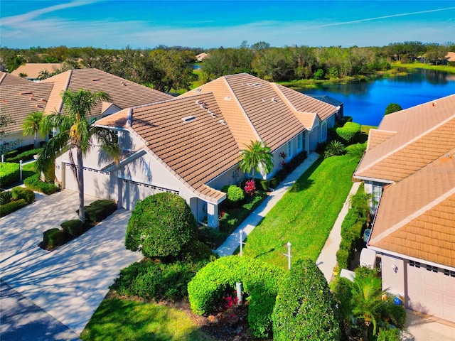 bird's eye view with a water view