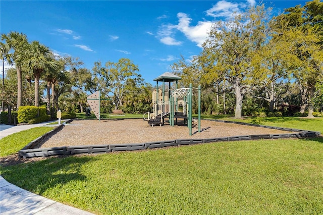 community playground featuring a yard