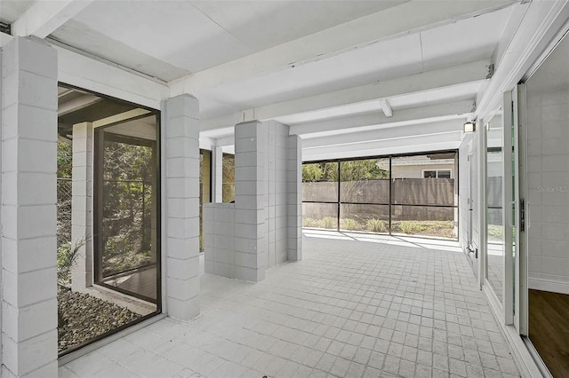 interior space with beamed ceiling