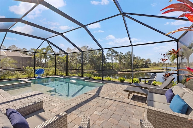 view of swimming pool with a patio area, a water view, a lanai, and a pool with connected hot tub