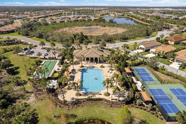 bird's eye view featuring a water view and a residential view